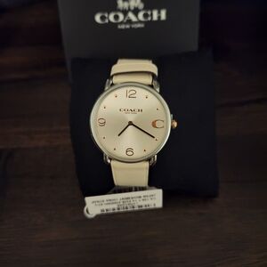 Coach Women's Cream Watch with Gold Details